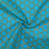 Broderie anglaise festonnée beige Aurélia fond bleu azur