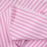 Polycoton rayé rose 5mm fond blanc