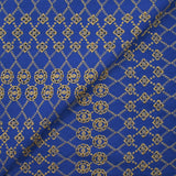 Broderie anglaise festonnée beige Clémence fond bleu roi