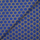 Broderie anglaise festonnée beige Aurélia fond bleu roi