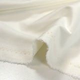 Tissu aspect daim double-face blanc cassé