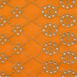 Broderie anglaise festonnée beige Clémence fond orange