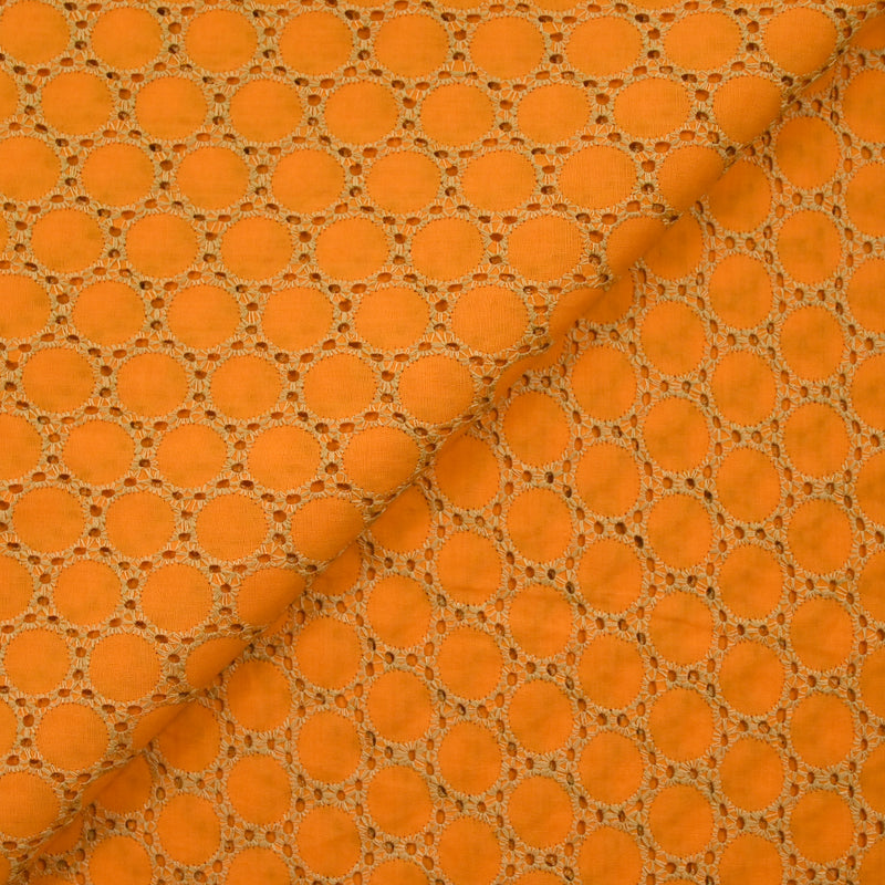 Broderie anglaise festonnée beige Aurélia fond orange