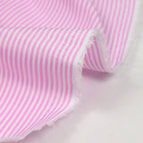 Polycoton rayé rose 1mm fond blanc