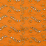 Beige scalloped English embroidery Éléonore orange background