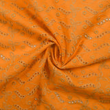 Beige scalloped English embroidery Éléonore orange background