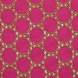 Broderie anglaise festonnée beige Aurélia fond fuchsia