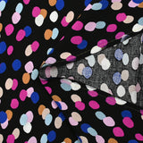 Viscose imprimée confettis magenta, camel et bleu roi fond noir