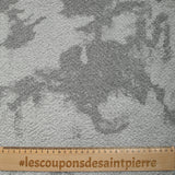 Maille texturée imprimée terre en pointillé fond gris