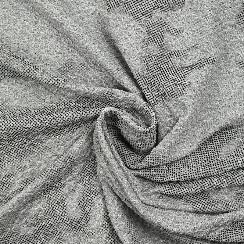 Maille texturée imprimée terre en pointillé fond gris