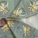 Sergé de coton imprimé roseraie vintage jaune pâle et bleu