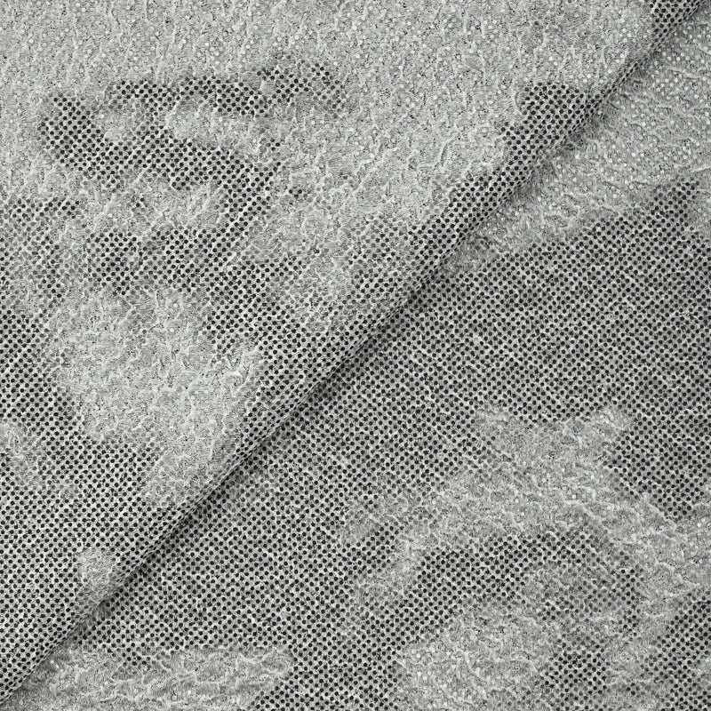 Maille texturée imprimée terre en pointillé fond gris