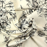 Cotton sketched print of flowers off-white background