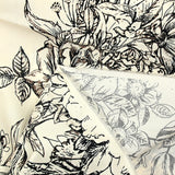 Cotton sketched print of flowers off-white background
