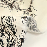 Cotton sketched print of flowers off-white background