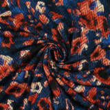 Maille chevron imprimée miraculeux fond bleu foncé