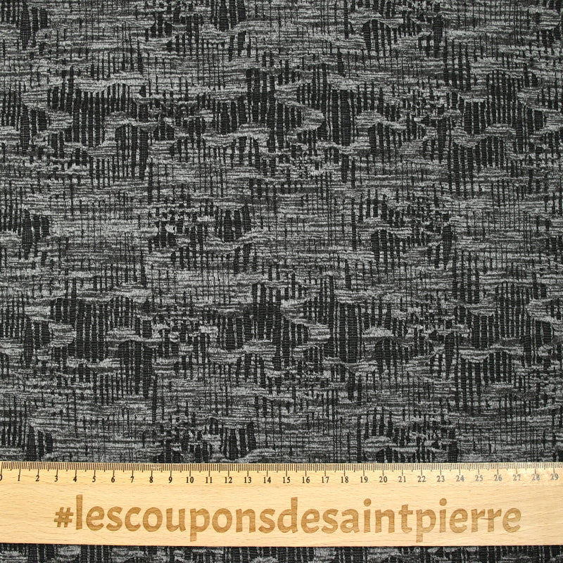 Maille texturée folie invasive gris et noir