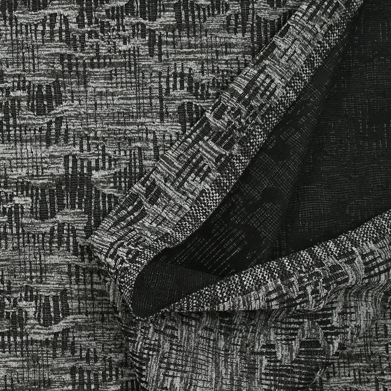 Maille texturée folie invasive gris et noir