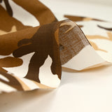 Brown and white camouflage printed cotton