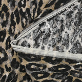 Dentelle imprimée instinct animal léopard fond beige