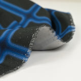 Satin de coton élasthanne carreaux bleu fond noir