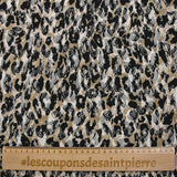 Dentelle imprimée instinct animal léopard fond beige