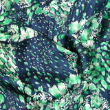 Mousseline de polyester imprimée bande satin marine et vert