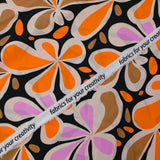 Viscose imprimée Flower Power orange et marron