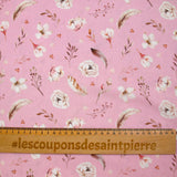 Cretonne de coton imprimé plume et fleur fond rose