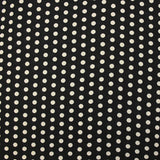 Viscose imprimée à pois 8mm écru fond noir