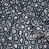 Mousseline imprimée pivoine turquoise fond marine