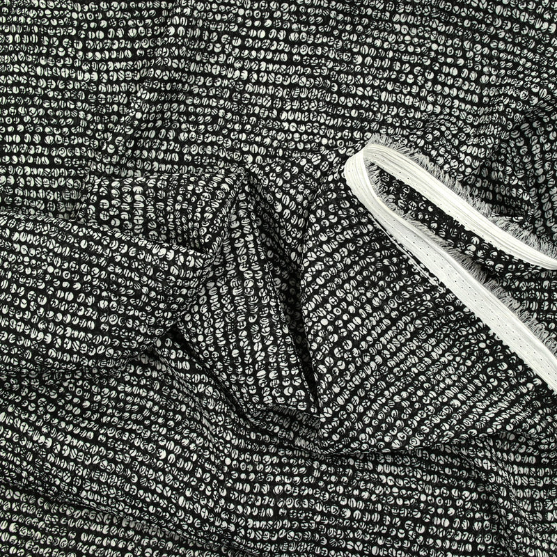 Mousseline imprimée à pois graphique fond noir