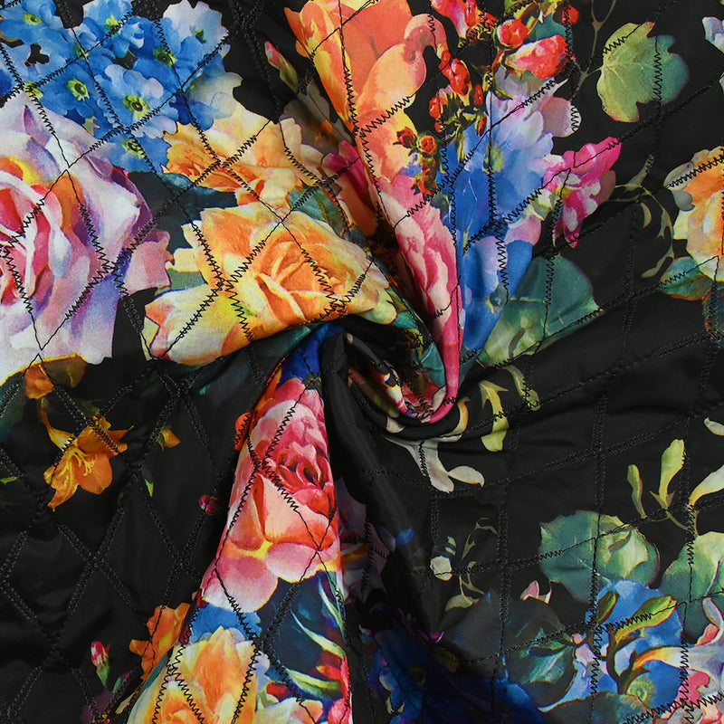 Matelassé imprimé fleurs colorées fond noir