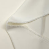 Crêpe de polyester lourd Louna blanc cassé