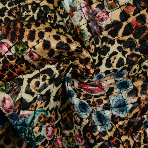 Matelassé imprimé bijoux fond léopard