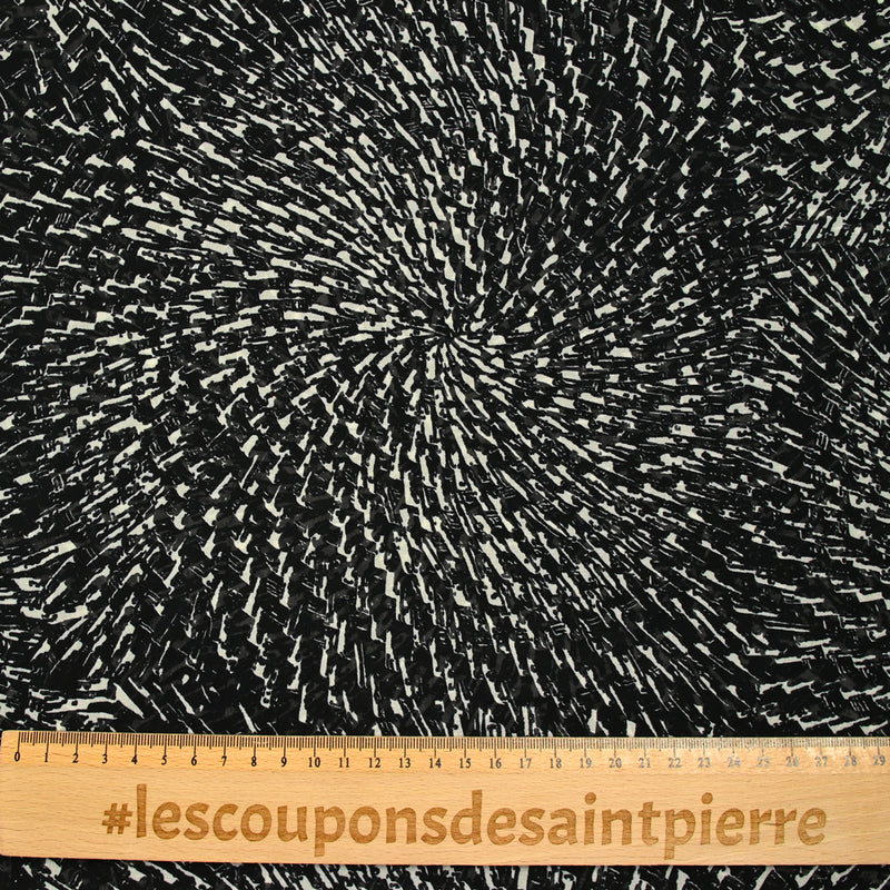 Mousseline imprimée spirales fond noir