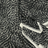 Mousseline imprimée spirales fond noir