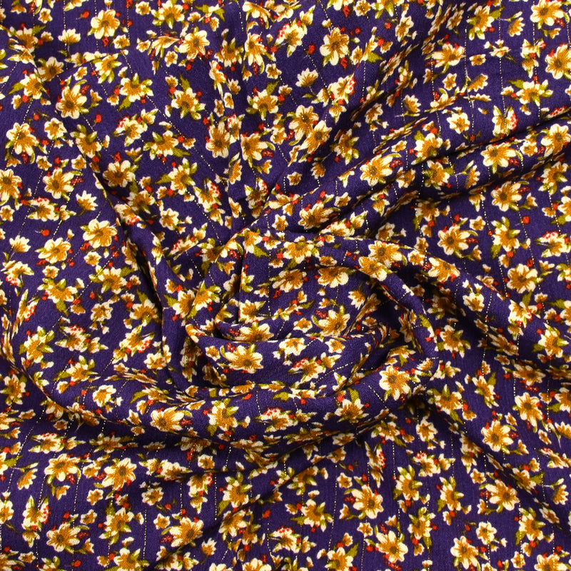 Crépon viscose lurex imprimé carousel de fleurs fond violet