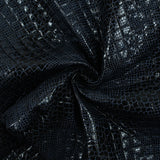 Matelassé imprimé reptile fond bleu marine