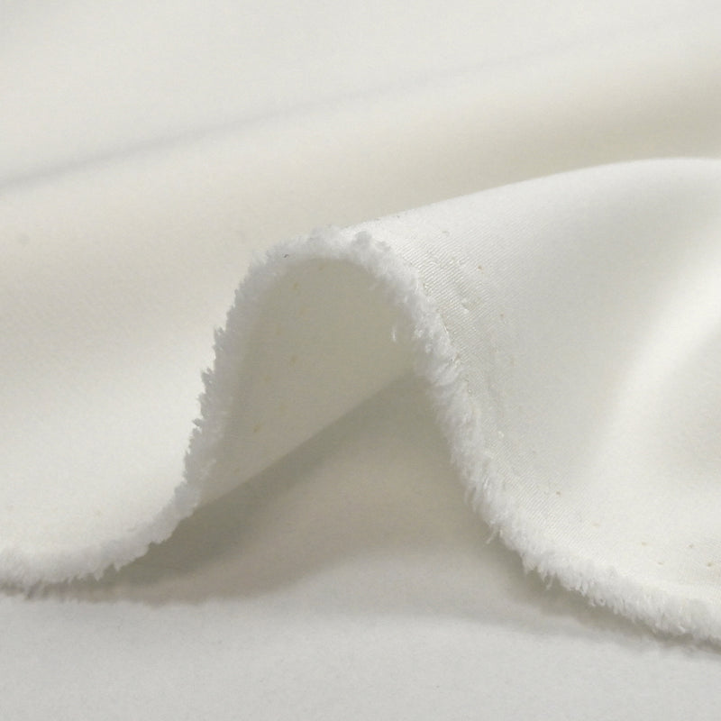 Crêpe de polyester lourd Louna blanc cassé