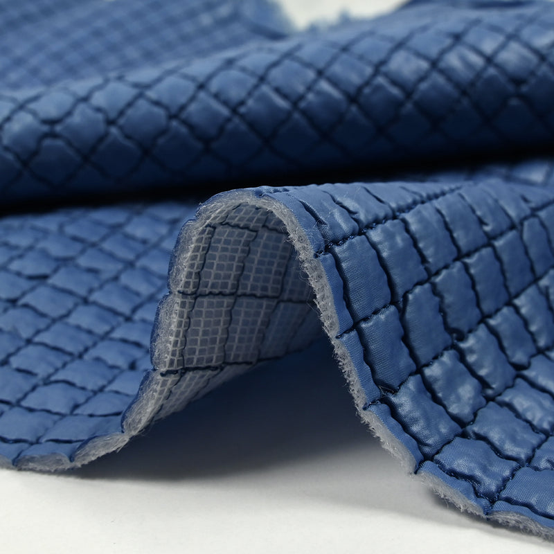 Matelassé à carreaux bleu barbeau