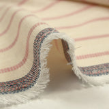 Viscose tissée-teinte rayée tomette fond écru