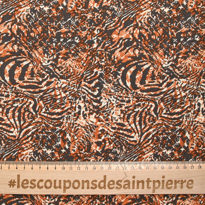 Crépon viscose lurex imprimé sauvage gris et orange brûlée