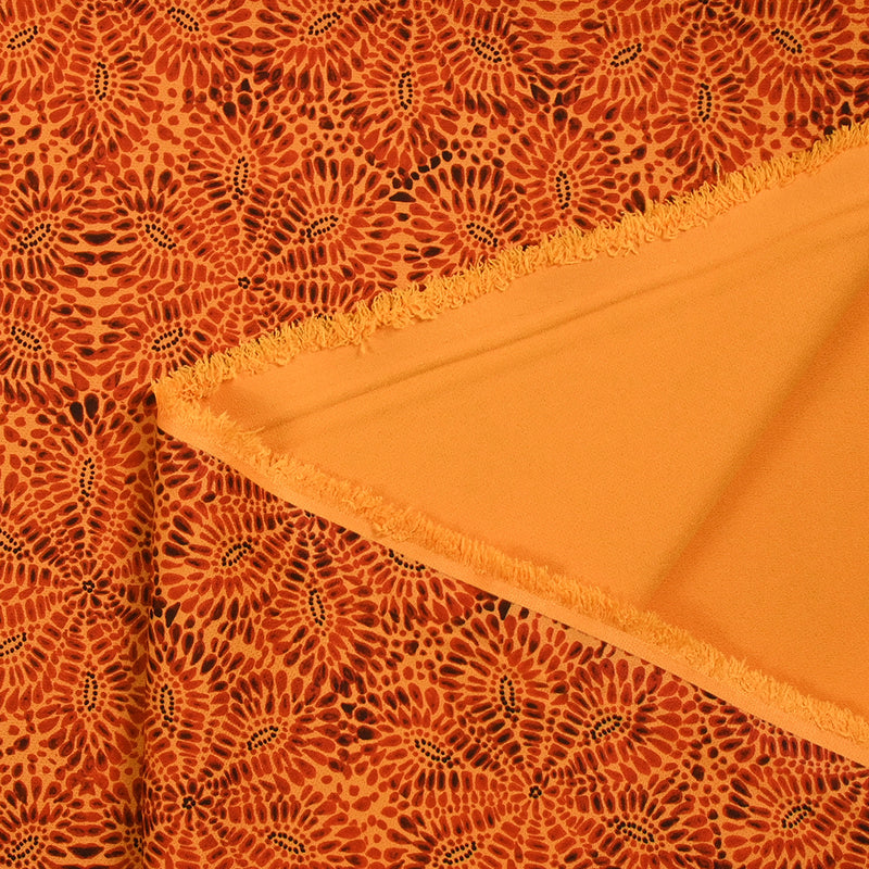 Heavy crêpe printed rosette orange background