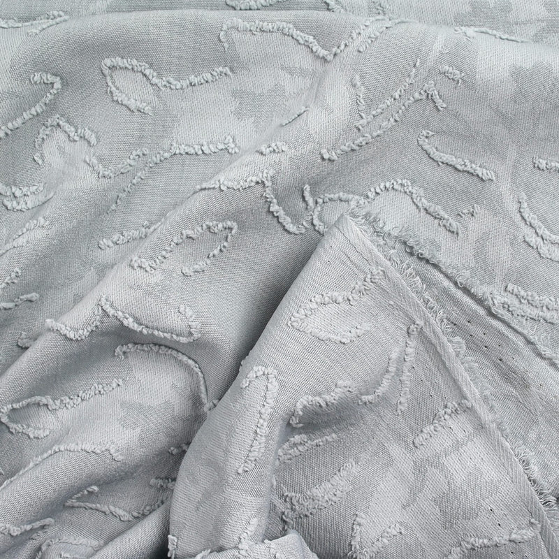 Jacquard de polyester fleurs plumetis gris