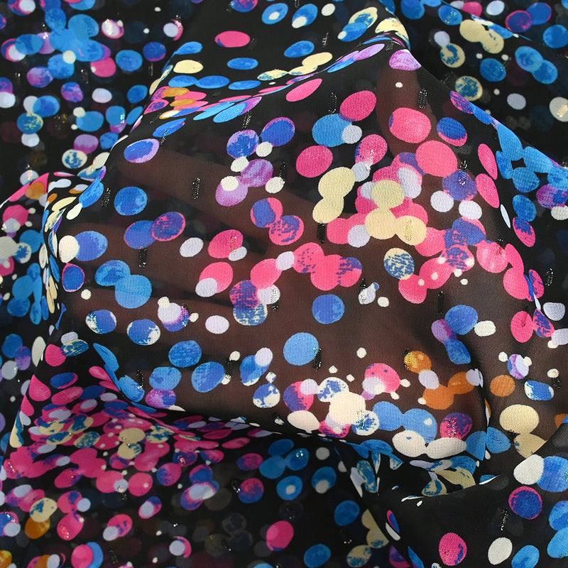 Mousseline imprimée plumetis lurex cellule bleu et rose fond noir