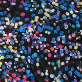 Mousseline imprimée plumetis lurex cellule bleu et rose fond noir