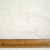 Jacquard de polyester fleurs plumetis blanc