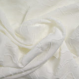 Jacquard de polyester fleurs plumetis blanc
