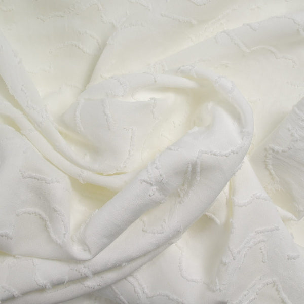 Jacquard de polyester fleurs plumetis blanc